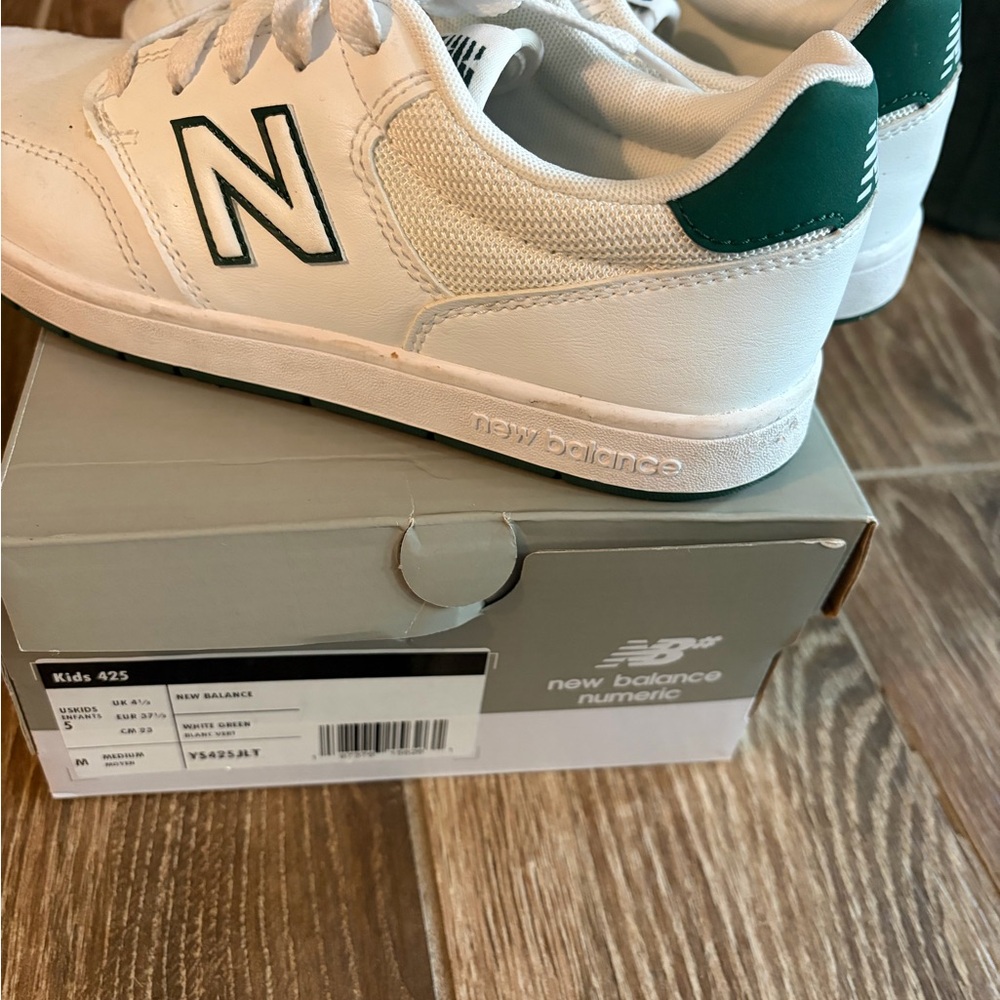New Balance White Sneakers with Green Heel and Black Logo Outline